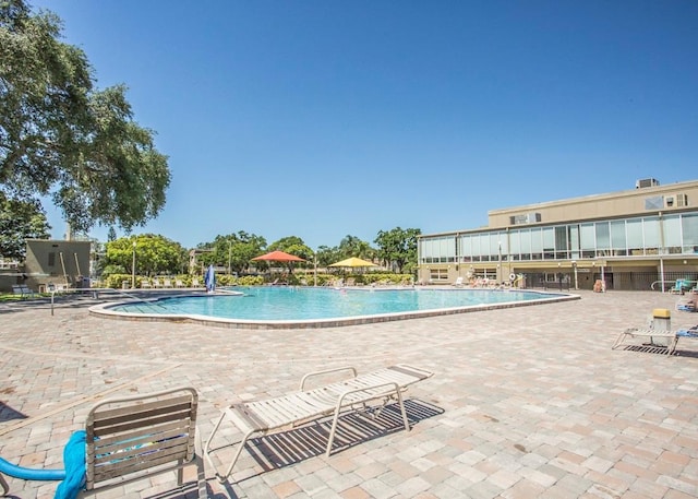 community pool featuring a patio