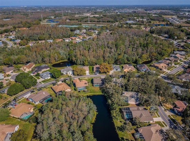 aerial view featuring a residential view and a water view