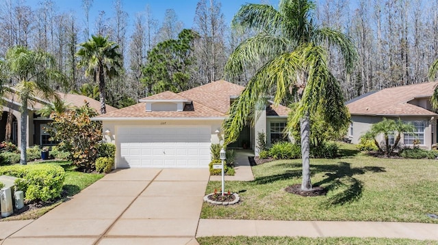 view of front facade featuring stucco siding, driveway, a front lawn, roof with shingles, and a garage