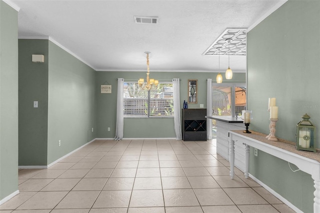 dining room featuring light tile patterned floors, visible vents, a chandelier, and ornamental molding