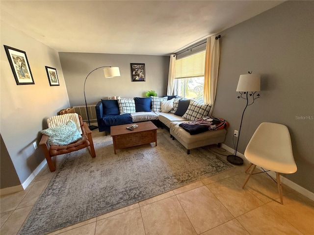 tiled living room with baseboards