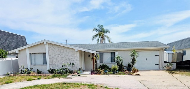 4030 Grayton Dr, New Port Richey, FL 34652 - ranch-style house with an attached garage, fence, stucco siding, and driveway