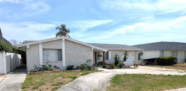 4030 Grayton Dr, New Port Richey, FL 34652 - ranch-style house with stucco siding, an attached garage, concrete driveway, and fence