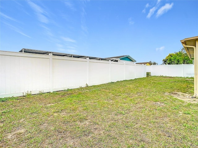 view of yard featuring a fenced backyard