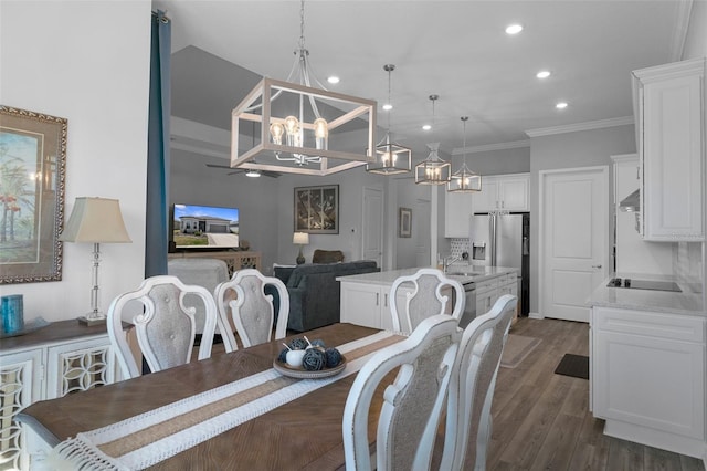 dining room with recessed lighting, dark wood-style floors, and ornamental molding