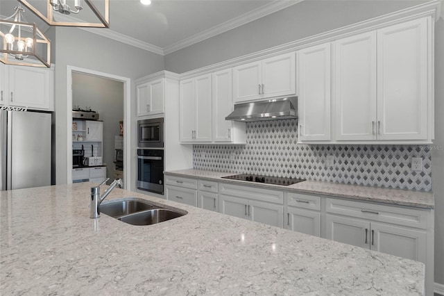 kitchen featuring under cabinet range hood, a sink, backsplash, appliances with stainless steel finishes, and crown molding