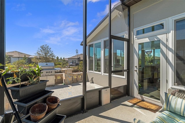 sunroom / solarium with a wealth of natural light