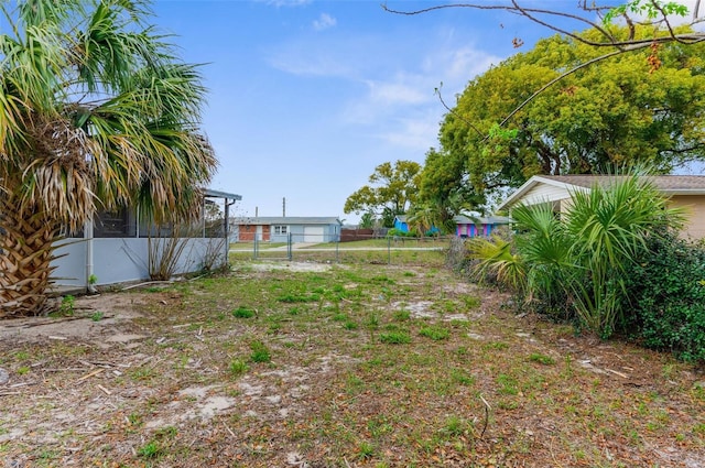 view of yard with fence