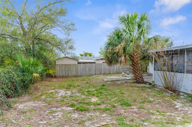 view of yard featuring fence