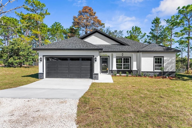 view of front of property with a front yard, an attached garage, stucco siding, concrete driveway, and stone siding