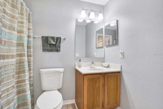 bathroom with vanity, toilet, and a shower with curtain