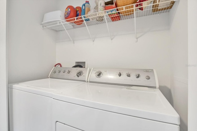 laundry area featuring laundry area and separate washer and dryer