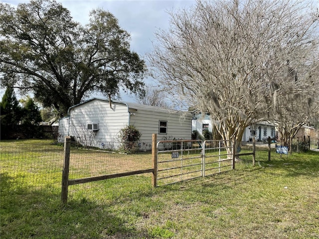 view of yard featuring a gate and fence