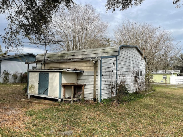 view of outdoor structure with an outdoor structure and fence