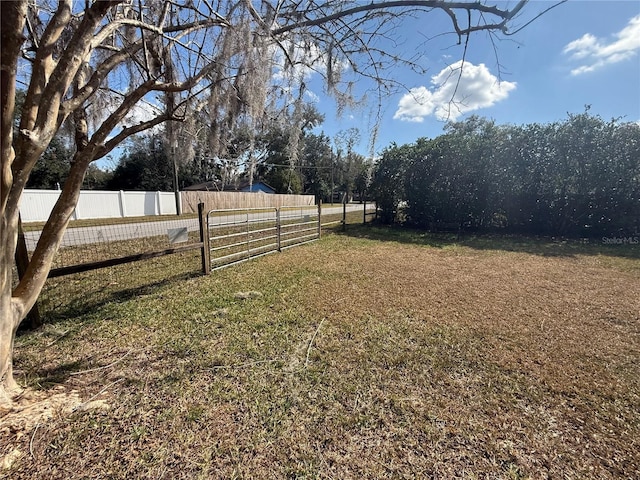 view of yard featuring fence