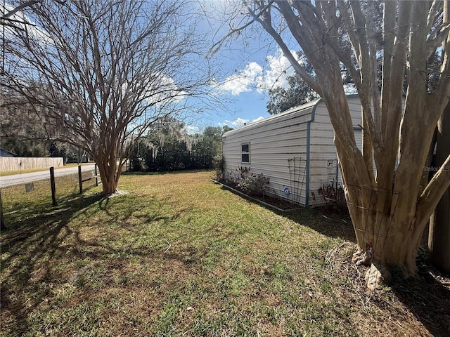 view of yard featuring fence