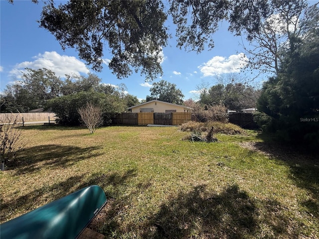 view of yard featuring fence