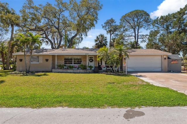 ranch-style house with a garage, concrete driveway, and a front lawn