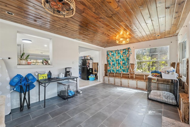 interior space featuring wooden ceiling