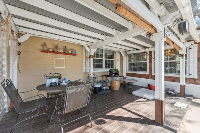 deck featuring outdoor dining area