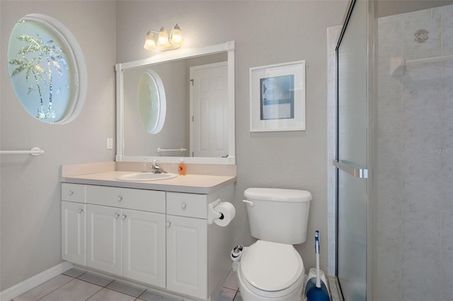 bathroom with toilet, a stall shower, vanity, and tile patterned flooring