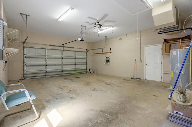 garage featuring gas water heater and a garage door opener