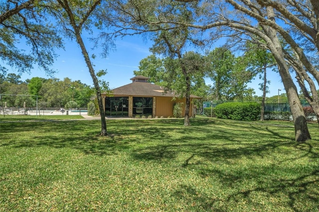 view of yard with fence