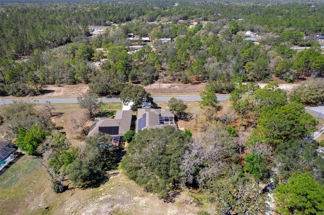 aerial view featuring a forest view