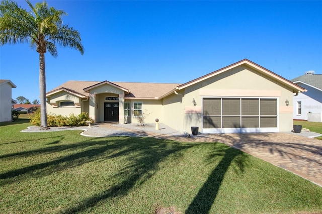 single story home featuring stucco siding, decorative driveway, a garage, and a front lawn