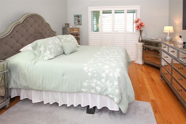 bedroom featuring wood finished floors