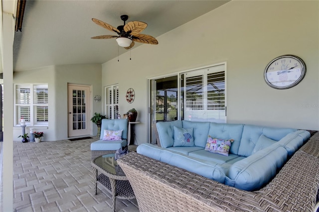 view of patio with outdoor lounge area and ceiling fan