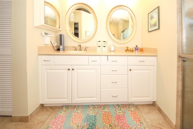 8609 Regal Ln, Hudson, FL 34667 - full bath with baseboards, tile patterned flooring, and vanity