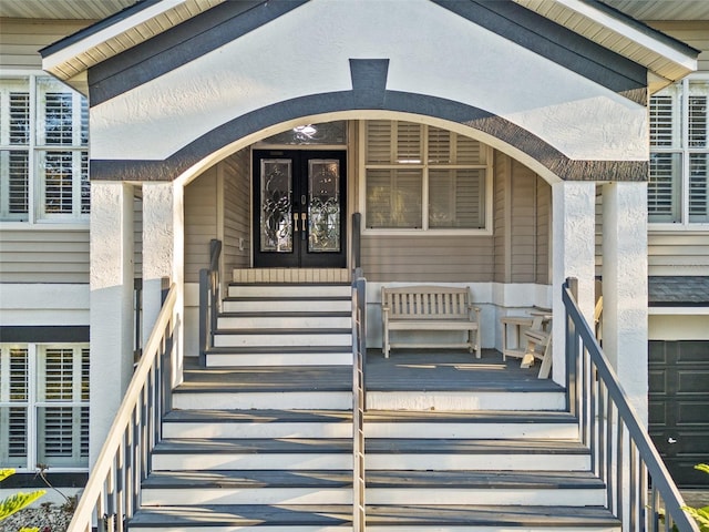 property entrance featuring french doors