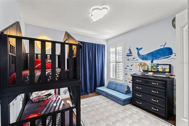 bedroom featuring a textured ceiling