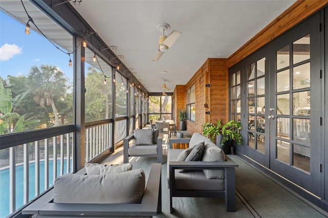 sunroom featuring french doors