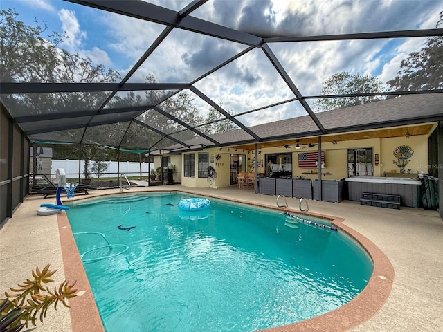 view of pool with a fenced in pool, fence, a ceiling fan, and a patio area