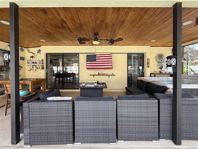 view of patio featuring outdoor lounge area and ceiling fan