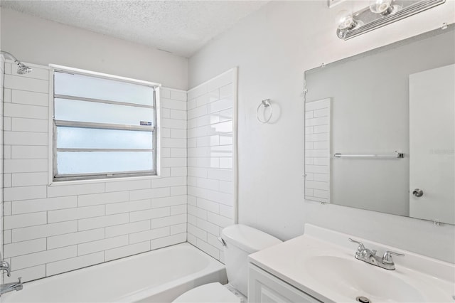 bathroom with shower / bath combination, a textured ceiling, vanity, and toilet