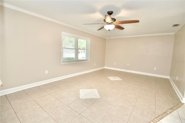 spare room with light tile patterned floors, a ceiling fan, baseboards, visible vents, and crown molding