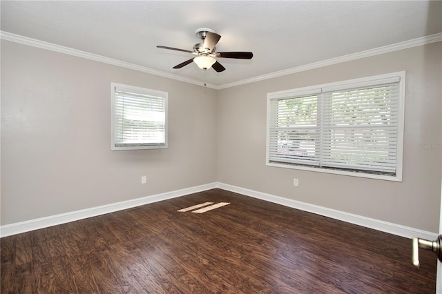 spare room with plenty of natural light, dark wood-style floors, and baseboards