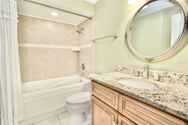 bathroom with tile patterned floors, toilet, shower / bath combo with shower curtain, and vanity