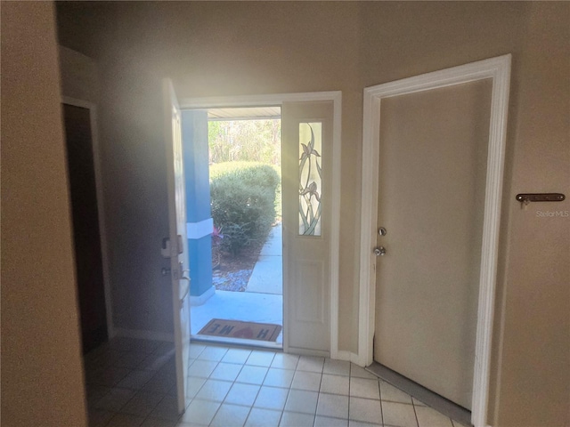 entrance foyer featuring light tile patterned flooring
