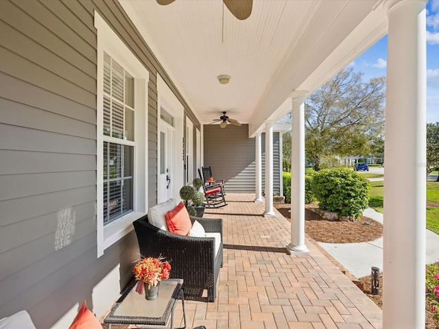 view of patio / terrace with a porch and ceiling fan