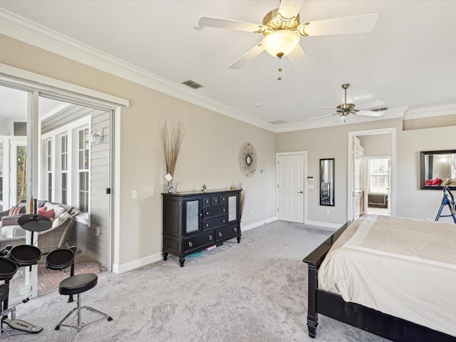 bedroom with visible vents, baseboards, carpet flooring, and crown molding