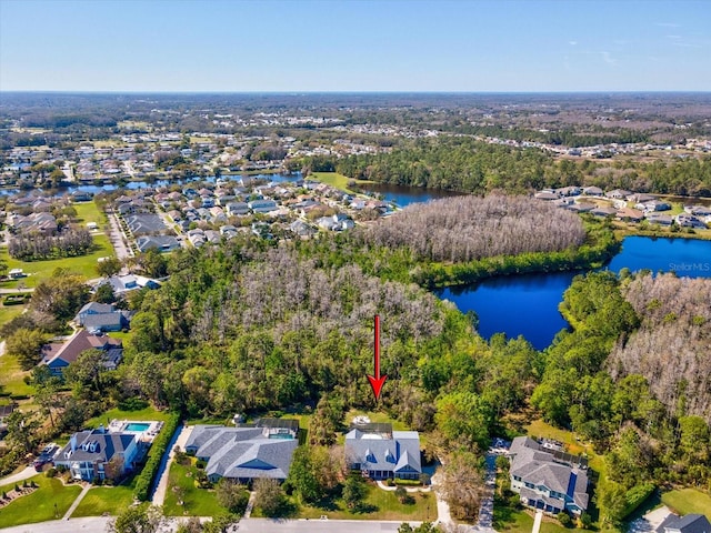 aerial view with a residential view and a water view