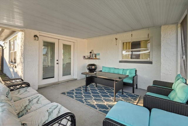 view of patio / terrace featuring an outdoor living space and french doors