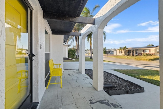 view of patio / terrace featuring a residential view