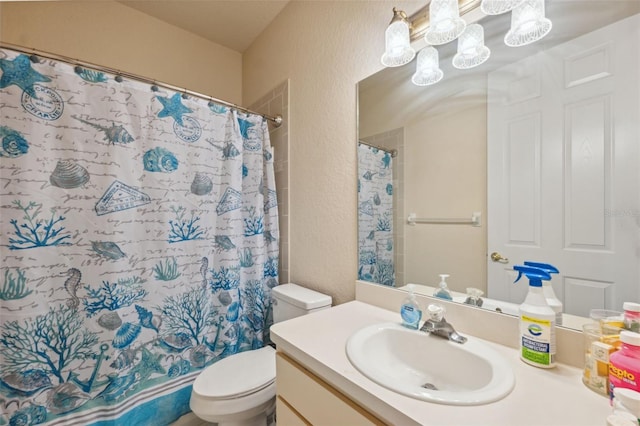 full bathroom featuring curtained shower, toilet, a textured wall, a notable chandelier, and vanity