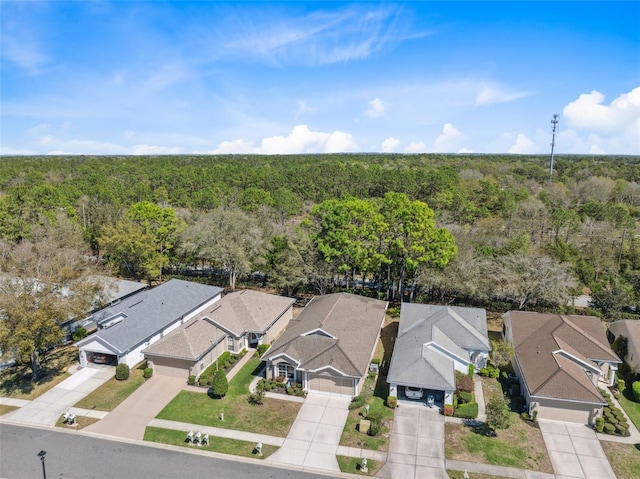 bird's eye view with a residential view and a view of trees