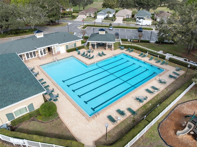 pool featuring a gazebo, a patio, and fence